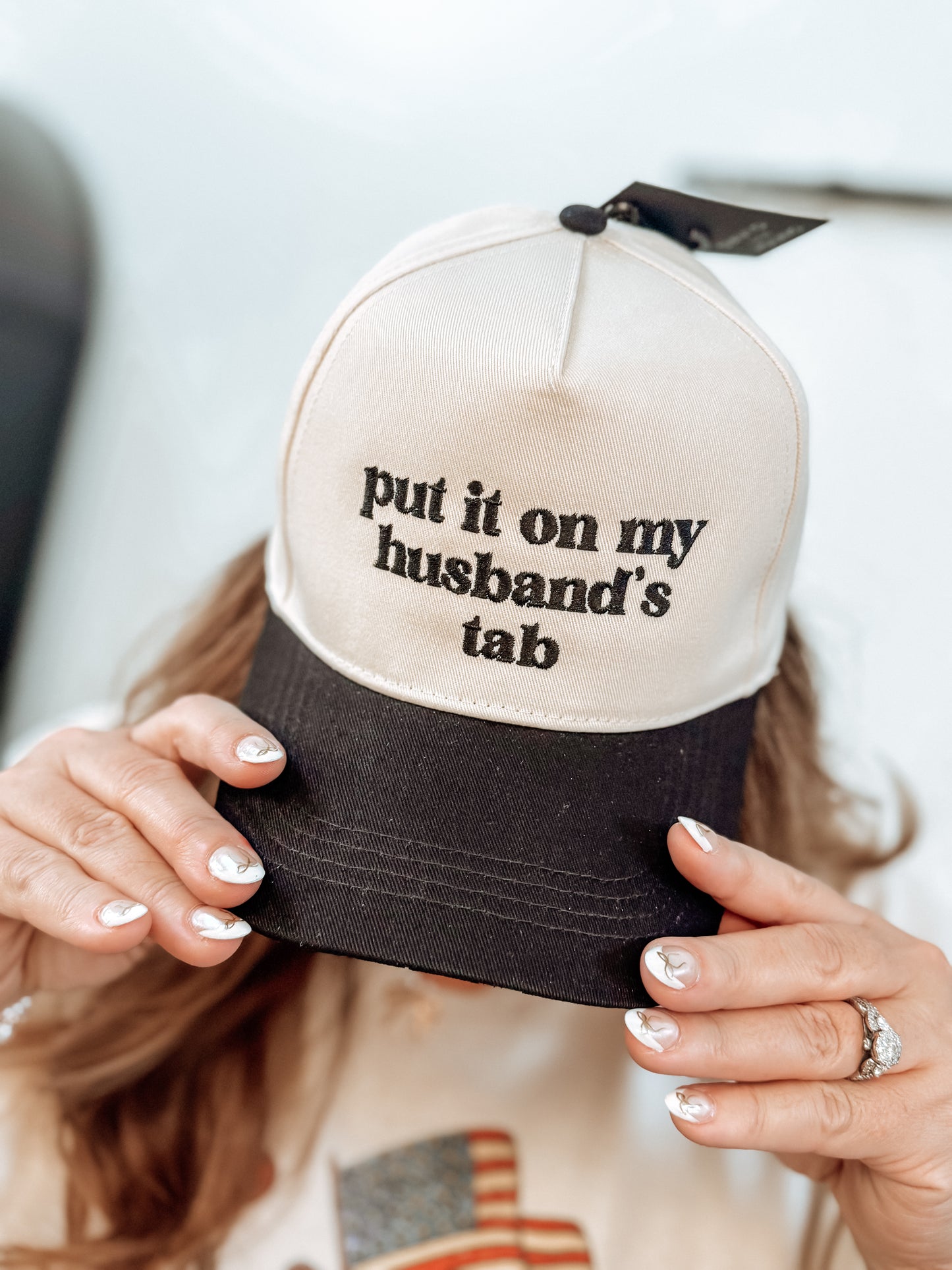 "Put it on my Husband’s Tab" Trucker Hat