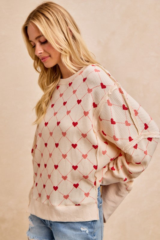 HEART PRINT SWEATSHIRT