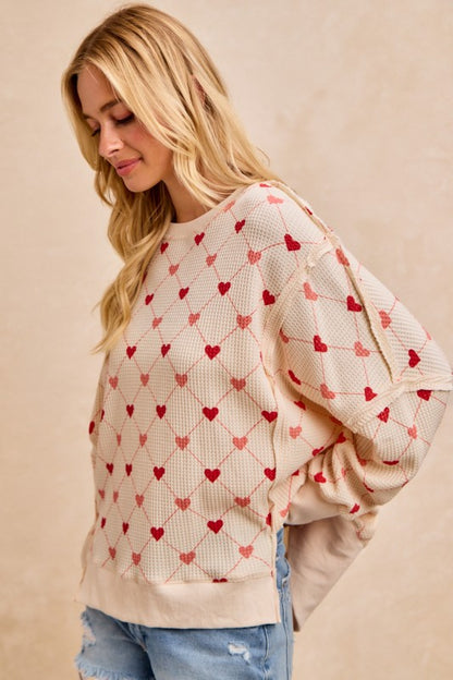 HEART PRINT SWEATSHIRT