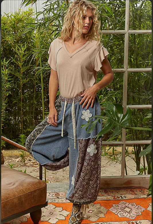 POL DENIM CHEETAH PANTS